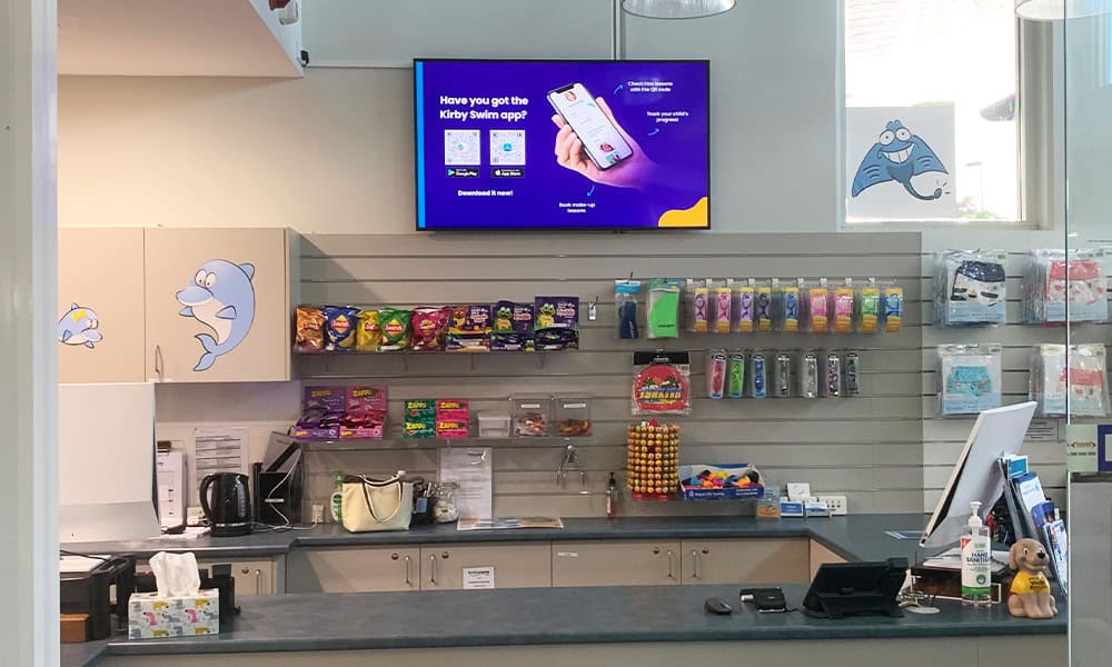 kirby swim digital signage installation fusion signage advanced